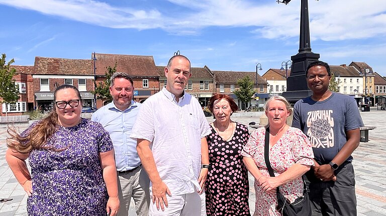 Several local Liberal Democrat campaigners on the Market Square