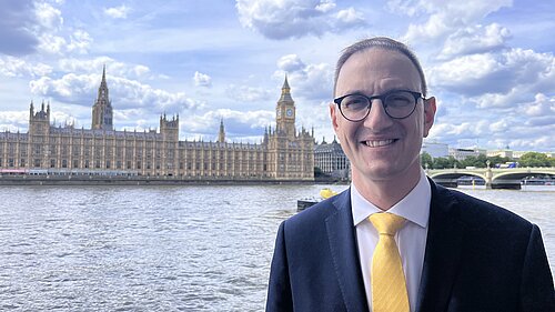 Ian Sollom MP pictured in front of the river outside of Westminster