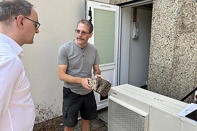 Paul Kershaw showing Ian Sollom MP his eco-friendly house
